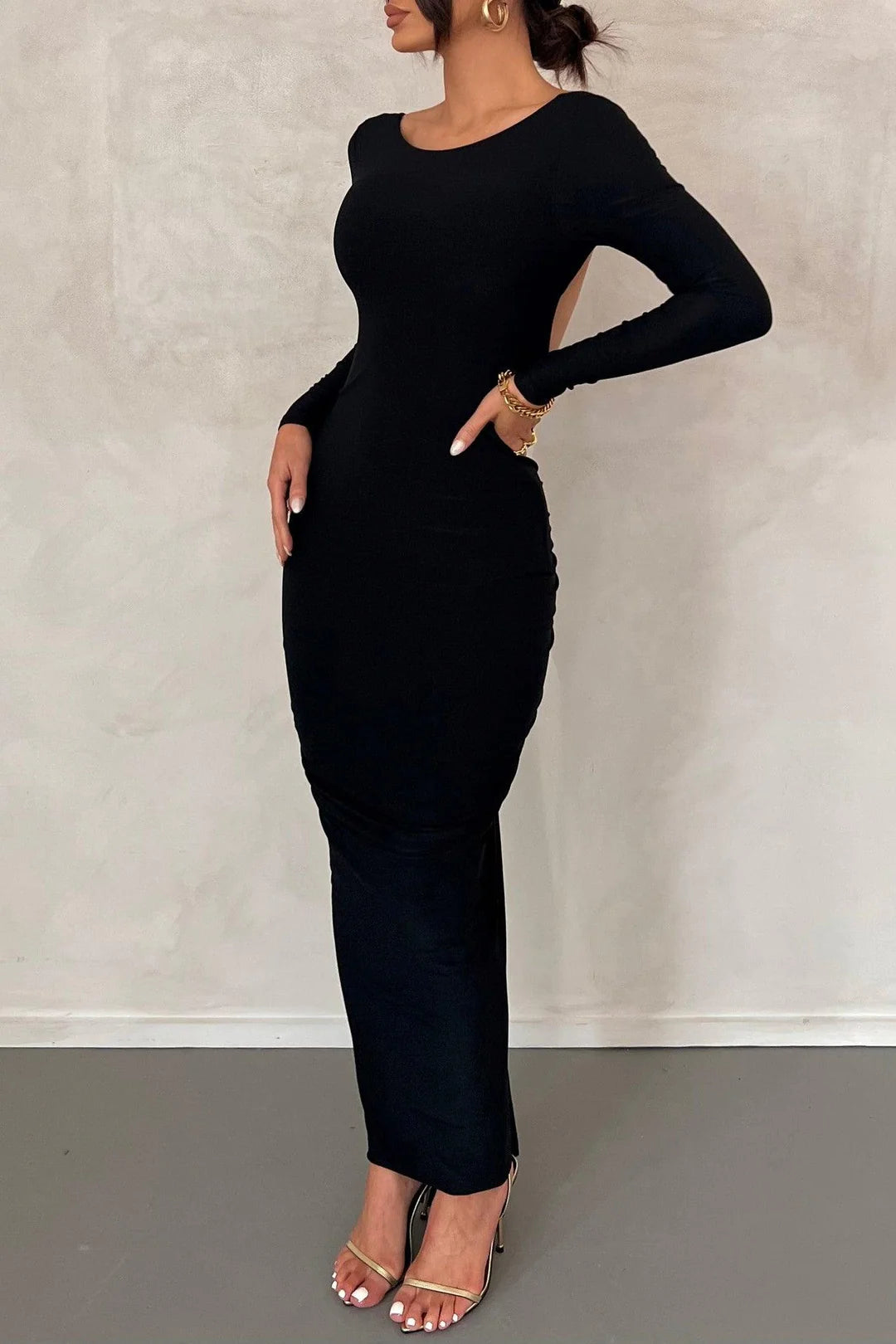 Black full sleeves backless dress