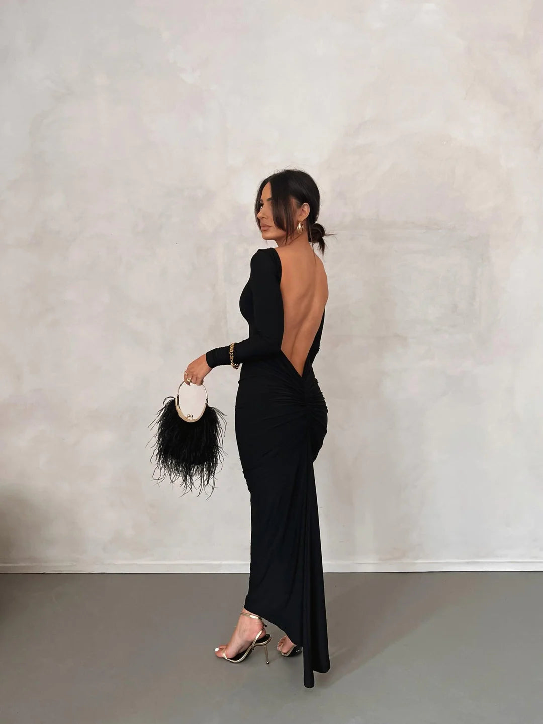 Black full sleeves backless dress Labelshalini Black full sleeves backless dress Labelshalini